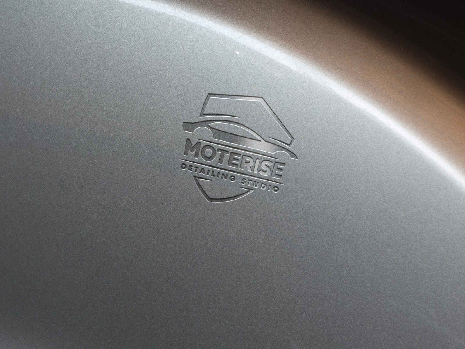 Moterise Detailing Studio brand name applied to metal signage designed by Identity Makers