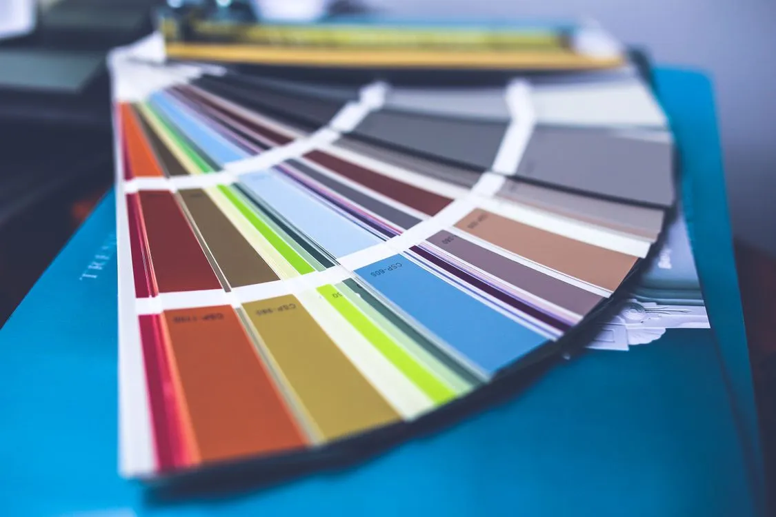 Primary brand color palette selection showing paint swatches for visual identity