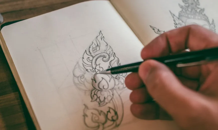 Designer sketching concepts by hand during the logo design process