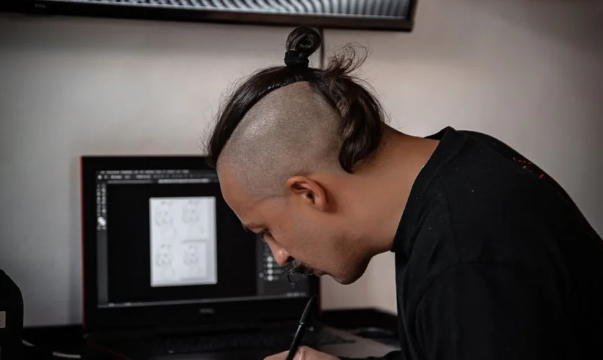Designer refining a mark against the principles of what makes a good logo